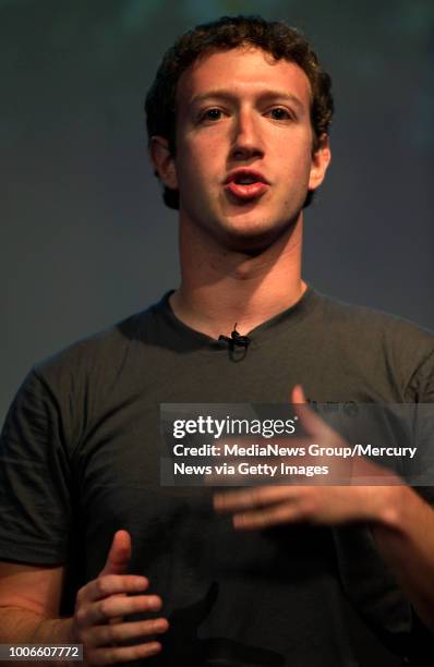 Mark Zuckerberg, CEO of Facebook, which he founded in 2004, answers quesitons during a press conference. Microsoft announced more collaboration with...