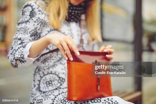 young woman in the city - leather bag stock pictures, royalty-free photos & images