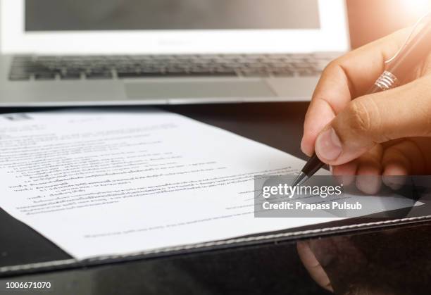 man signing contract. close up. deal concept - deal signing stockfoto's en -beelden