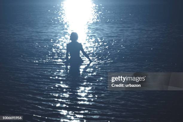 ripples shadows and light - beach dress stock pictures, royalty-free photos & images