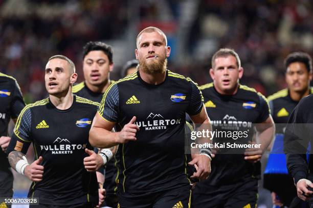 Captain Brad Shields of the Hurricanes and his team mates look on priorthe Super Rugby Semi Final match between the Crusaders and the Hurricanes at...