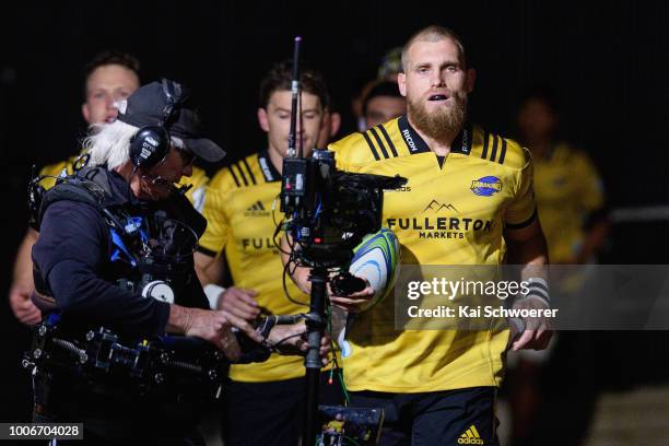 Captain Brad Shields of the Hurricanes leads his team onto the field prior to the Super Rugby Semi Final match between the Crusaders and the...