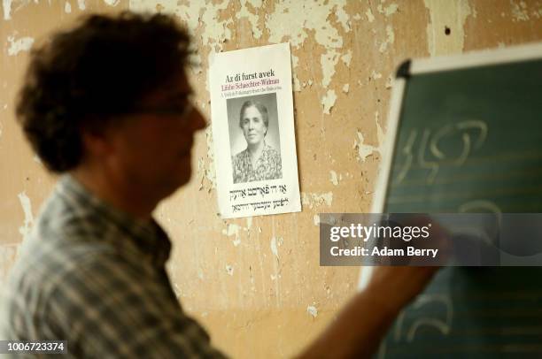 An image of Yiddish singer Lifshe Schaechter-Widman hangs on the wall during a Yiddish language course during Yiddish Summer Weimar on July 27, 2018...