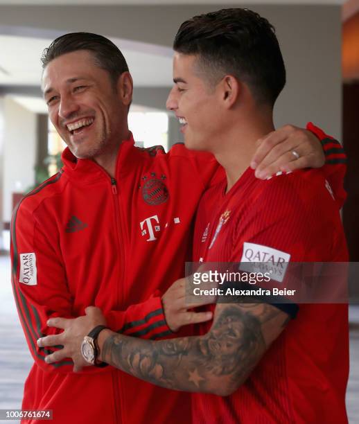 James Rodriguez of FC Bayern Muenchen meets team coach Niko Kovac for the first time during the FC Bayern AUDI Summer Tour on July 27, 2018 at...