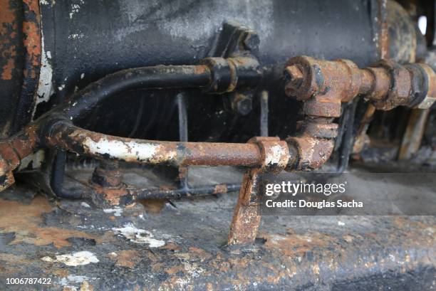 corrosion and rust covered machinery - conduit pipe stock pictures, royalty-free photos & images