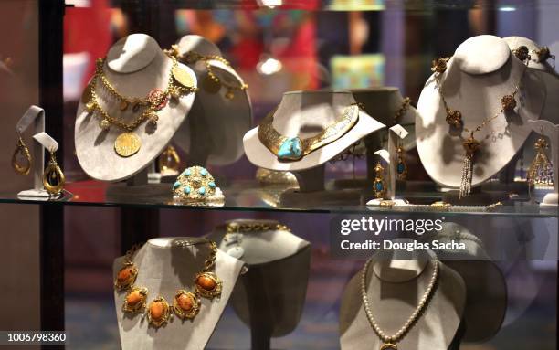 jewelry for sale in a store display case - silver spoon in mouth stock pictures, royalty-free photos & images