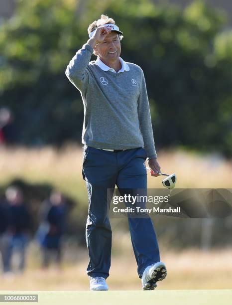 Bernhard Langer of Germany celebrates making a birdie on the 17th green during Day Three of The Senior Open Presented by Rolex at The Old Course on...