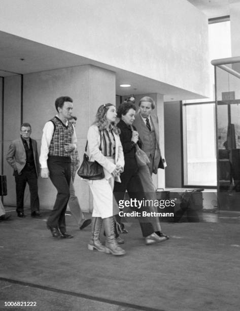 Bessy Stapleton mother of Samuel Dodd one of 33 young men and boys John Wayne Gacy is accused of slaying, is escorted by assistance Cook County...