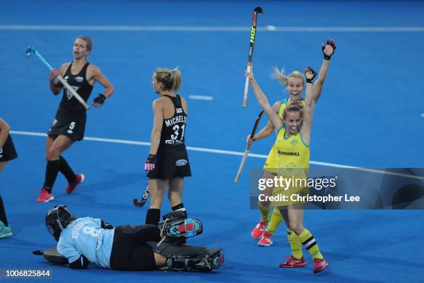 Emily Smith of Australia celebrates scoring their first goal during the Pool D game between New Zealand and Australia of the FIH Womens Hockey World...