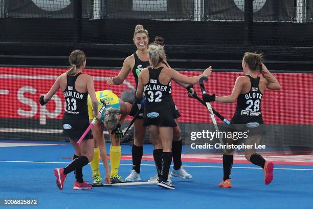Olivia Merry of New Zealand celebrates scoring their first goal during the Pool D game between New Zealand and Australia of the FIH Womens Hockey...
