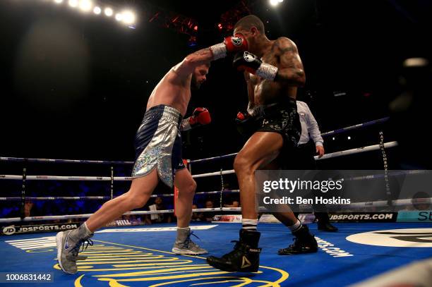 Cedric Peynaud punches Conor Benn during the WBA Continental Welterweight Championship title fight between Conor Benn and Cedric Peynaud at The O2...