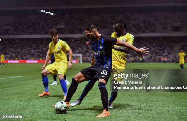 Danilo D'Ambrosio of FC Internazionale is tackled by Tiemoue Bakayoko of Chelsea during the International Champions Cup 2018 match between Chelsea...
