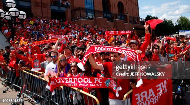 Liverpool FC fans cheer as team busses arrive before the match against Manchester United in the 2018 International Champions Cup at Michigan Stadium...