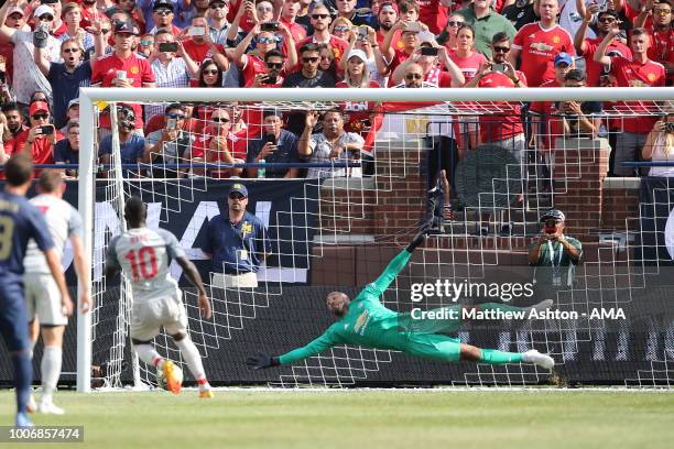 Sadio Mane of Liverpool scores a goal from the penalty spot to make it 1-0 during the International Champions Cup 2018 match between Manchester...