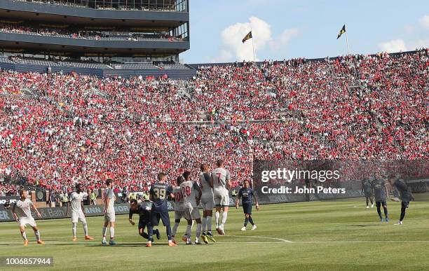 Andreas Pereira of Manchester United scores their first goal during the pre-season friendly match between Manchester United and Liverpool at Michigan...