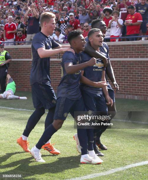Andreas Pereira of Manchester United celebrates scoring their first goal during the pre-season friendly match between Manchester United and Liverpool...