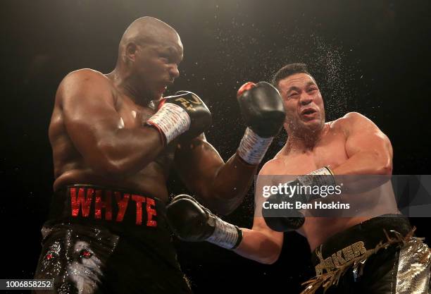 Dillian Whyte punches Joseph Parker during the Heavyweight fight between Dillian Whyte and Joseph Parker at The O2 Arena on July 28, 2018 in London,...