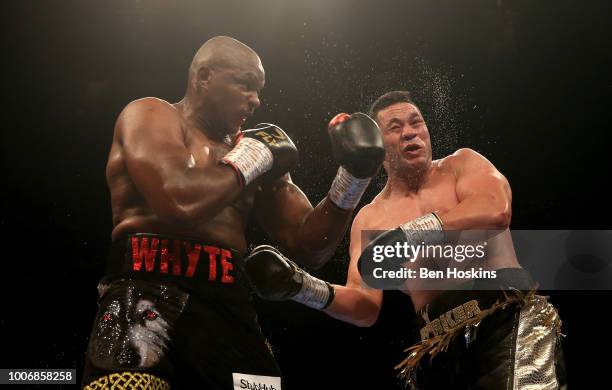 Dillian Whyte punches Joseph Parker during the Heavyweight fight between Dillian Whyte and Joseph Parker at The O2 Arena on July 28, 2018 in London,...