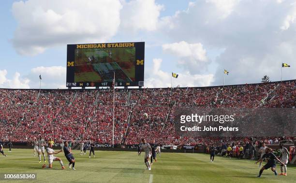 Alexis Sanchez and Juan Mata of Manchester United in action during the pre-season friendly match between Manchester United and Liverpool at Michigan...