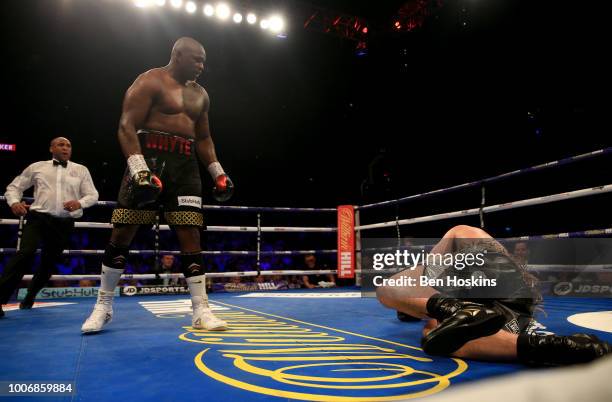 Dillian Whyte knocks down Joseph Parker during the Heavyweight fight between Dillian Whyte and Joseph Parker at The O2 Arena on July 28, 2018 in...