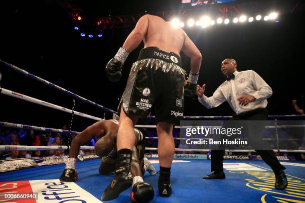 Joseph Parker knocks Dillian Whyte down during the Heavyweight fight between Dillian Whyte and Joseph Parker at The O2 Arena on July 28, 2018 in...