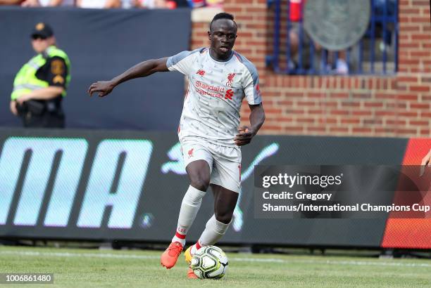 Sadio Mane of Liverpool moves the ball in the first half against Manchester United during the International Champions Cup 2018 match at Michigan...