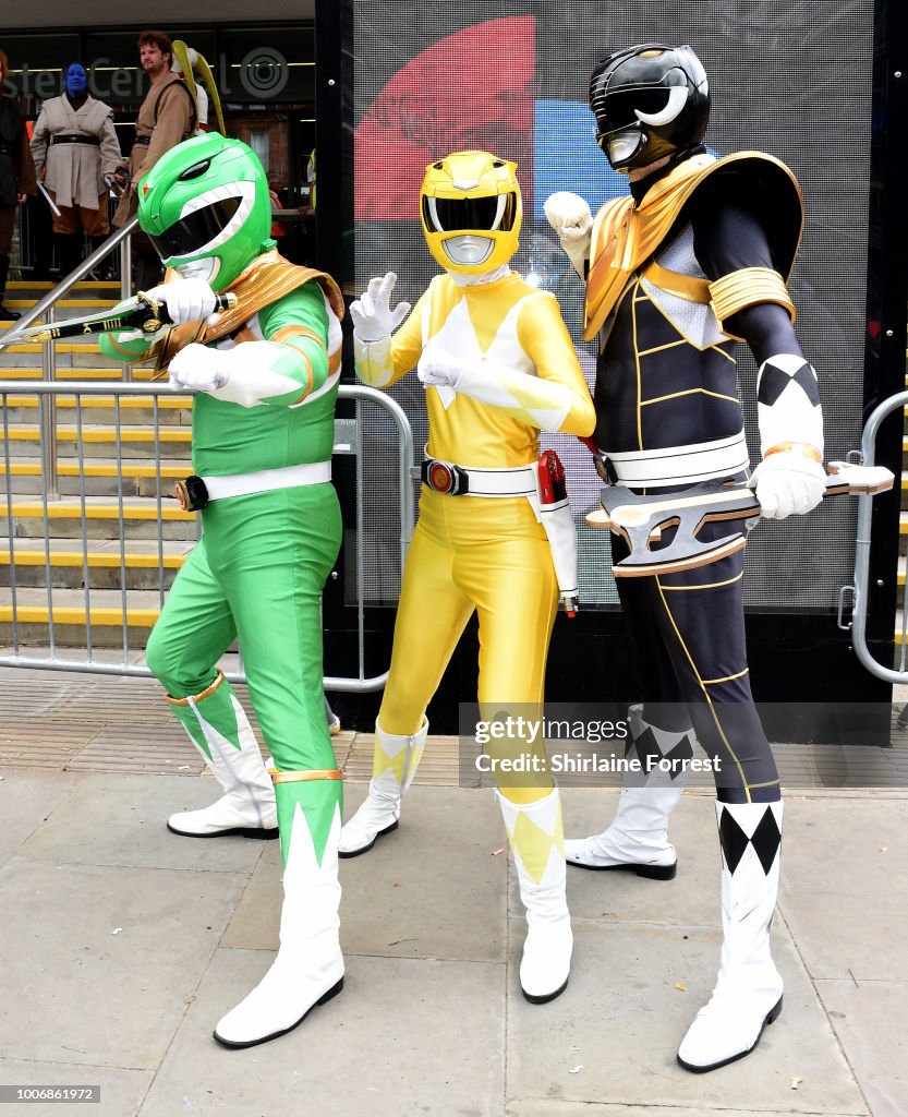 Power Ranger Manchester Cosplayers dressed as Power Rangers pose during MCM Comic Con 2018 at ...
