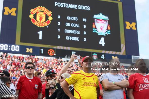 Fans of Liverpool watch their team in a 1-4 victory in the International Champions Cup 2018 match between Manchester Untied and Liverpool at Michigan...
