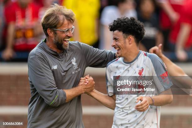 Head coach Jurgen Klopp celebrates with Curtis Jones after Liverpool defeated Manchester United during second half of the International Champions Cup...