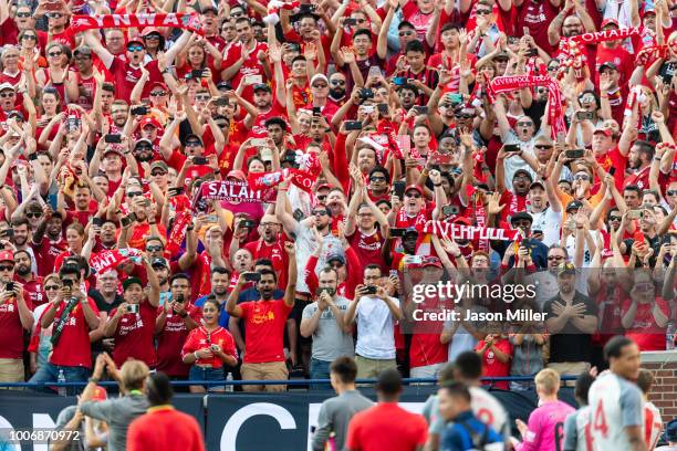 Liverpool fans celebrate as their team tours the stadium after defeating Manchester United during the International Champions Cup 2018 at Michigan...