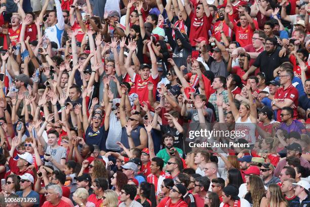 Manchester United fans watch from the stand during the pre-season friendly match between Manchester United and Liverpool at Michigan Stadium on July...