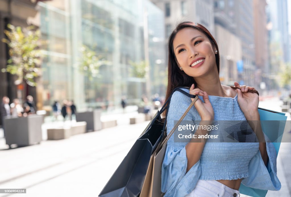 Beautiful Asian woman shopping