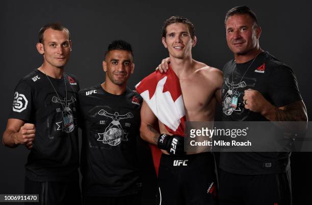 Jordan Mein of Canada poses for a portrait backstage with his team after his victory over Alex Morono during the UFC Fight Night event at Scotiabank...