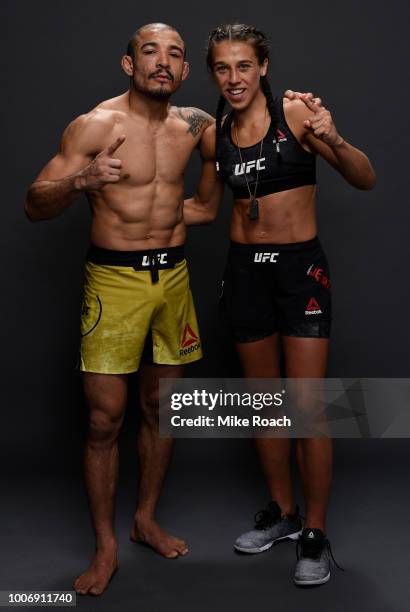 Jose Aldo of Brazil and Joanna Jedrzejczyk of Poland pose for a portrait backstage after their victories during the UFC Fight Night event at...
