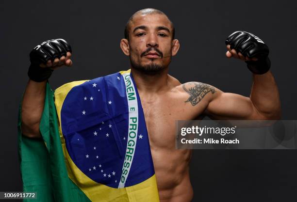 Jose Aldo of Brazil poses for a portrait backstage after his victory over Jeremy Stephens during the UFC Fight Night event at Scotiabank Saddledome...