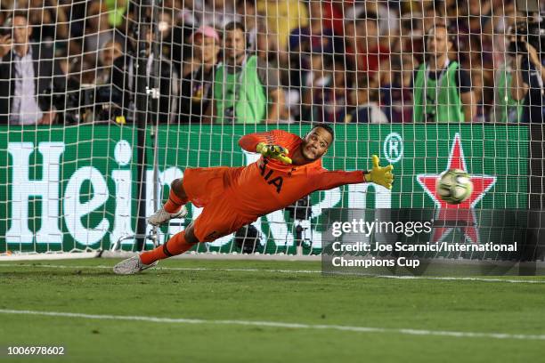 Michel Vorm of Tottenham Hotspur is unable to stop the penalty kick during an International Champions Cup match against FC Barcelona at Rose Bowl on...