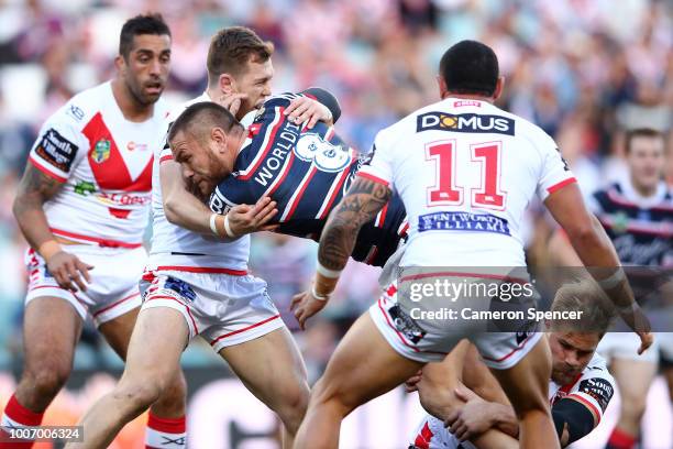 Jared Waerea-Hargreaves of the Roosters is tackled during the round 20 NRL match between the Sydney Roosters and the St George Illawarra Dragons at...