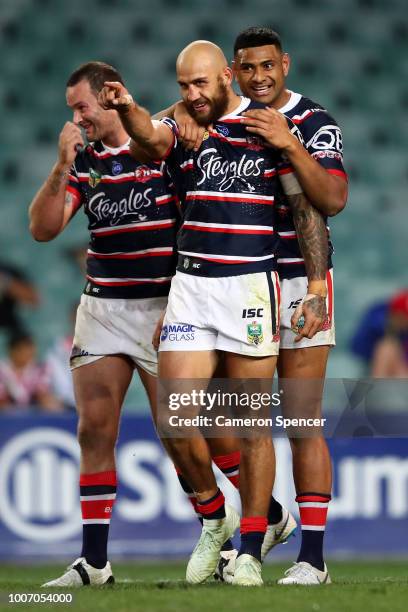 Blake Ferguson of the Roosters celebrates scoring a try during the round 20 NRL match between the Sydney Roosters and the St George Illawarra Dragons...