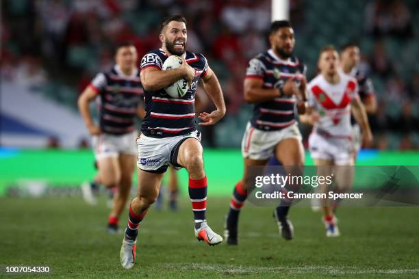 James Tedesco of the Roosters makes a break during the round 20 NRL match between the Sydney Roosters and the St George Illawarra Dragons at Allianz...