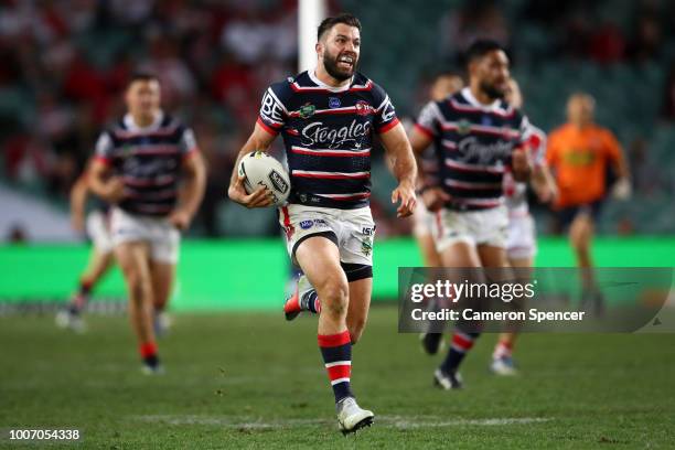 James Tedesco of the Roosters makes a break during the round 20 NRL match between the Sydney Roosters and the St George Illawarra Dragons at Allianz...