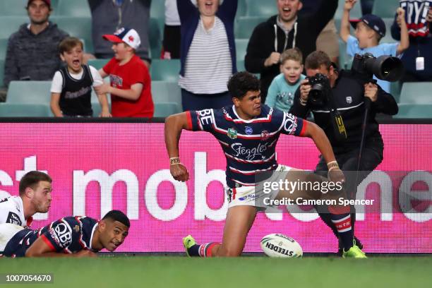 Latrell Mitchell of the Roosters celebrates scoring a try during the round 20 NRL match between the Sydney Roosters and the St George Illawarra...