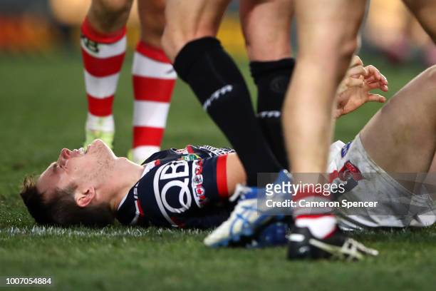 Luke Keary of the Roosters injures himself during the round 20 NRL match between the Sydney Roosters and the St George Illawarra Dragons at Allianz...