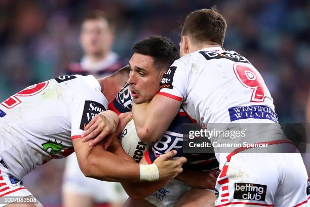 Ryan Matterson of the Roosters is tackled during the round 20 NRL match between the Sydney Roosters and the St George Illawarra Dragons at Allianz...