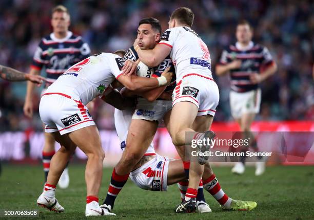 Ryan Matterson of the Roosters is tackled during the round 20 NRL match between the Sydney Roosters and the St George Illawarra Dragons at Allianz...