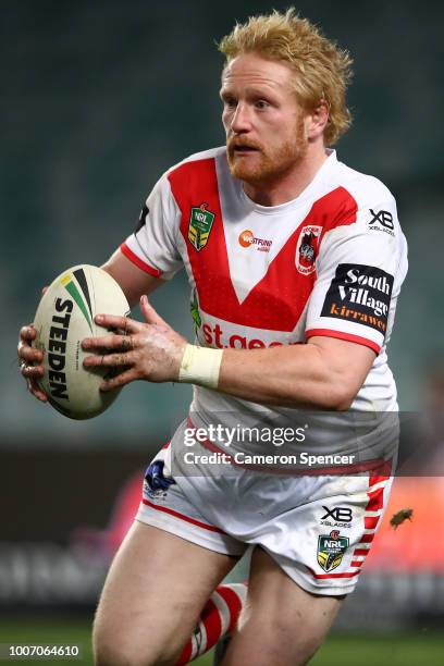 James Graham of the Dragons runs the ball during the round 20 NRL match between the Sydney Roosters and the St George Illawarra Dragons at Allianz...