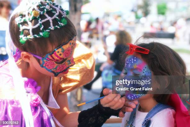 face painting in old montreal, canada - fete bildbanksfoton och bilder