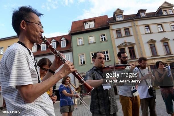 Klezmer musicians perform on Herderplatz square during Yiddish Summer Weimar on July 28, 2018 in Weimar, Germany. The annual four-week summer...