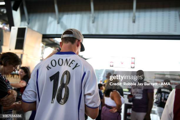 Fan of DC United is seen wearing and old Everton shirt with Wayne Rooney of DC United on the back prior to the MLS match between DC United and...