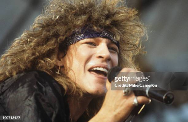Jon Bon Jovi of Bon Jovi performs on stage circa 1986.