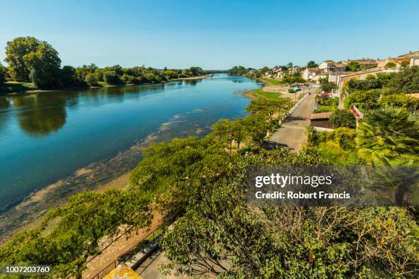 view northwest along the river lot bank at this large town with a historic bastide centre, villeneuve-sur-lot, lot-et-garonne, france, europe - lot y garona fotografías e imágenes de stock